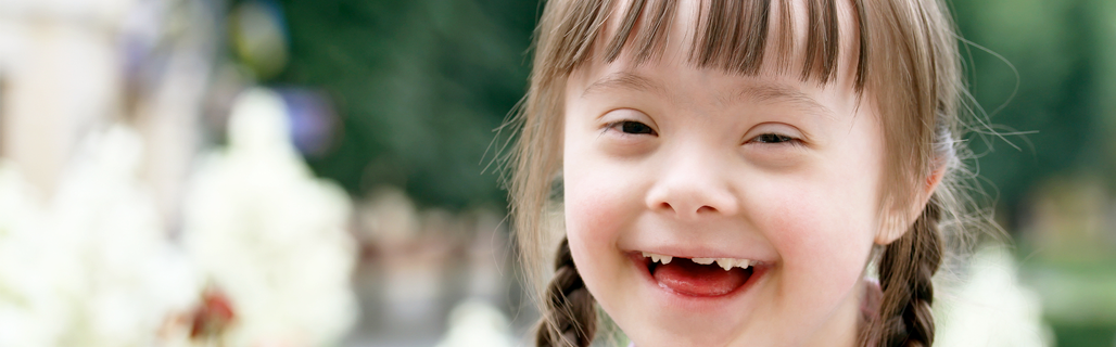 A special needs child smiling